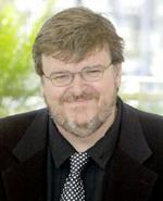 Michael Moore fik guldpalmerne i Cannes for sin kontroversielle film 'Fahrenheit 9/11'. - Foto: AP 