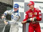 Storebror og lillebror i champagnerus. Michael Schumacher (th) slag lillebror Ralf Schumacher i det canadiske Formel 1-grandprix. - Foto: AP 