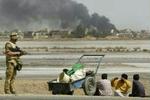 Fire britiske soldater er under mistanke for at begået mishandlinger mod irakere. - Arkivfoto: AP 