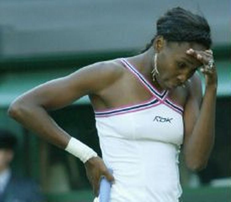 Venus Williams ærger sig. - Foto: AP 