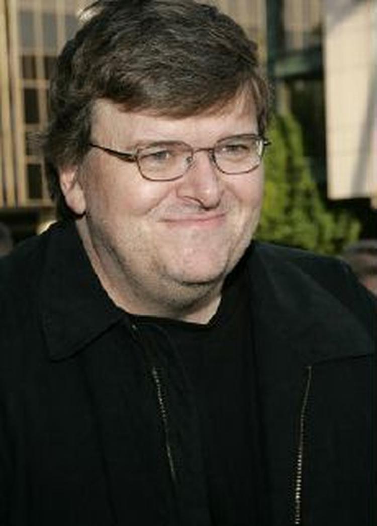 Michael Moore fik Guldpalmerne i Cannes for sin film. - Foto: AP 