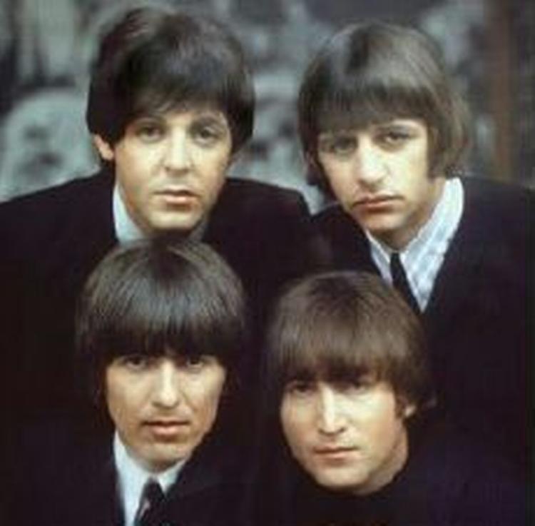 De fire 'Beatler' med John Lennon nederst til højre. - Foto: AP 