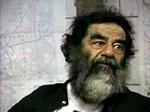 Retssagen imod Iraks tidligere diktator, Saddam Hussein, starter i dag. En folkeretsekspert opfordrer til at sende retssagen direkte på tv. - Arkivfoto: AP 
