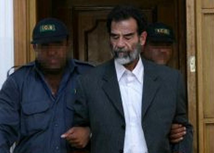 Moammar Gaddafis datter, Aicha, vil nu hjælpe med at sikre Saddam Hussein en retfærdig retssag. - Foto: AP 