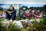 Graffitimaleren Andreas Albrechtsen, 17, ved den lovlige graffitimur i Sydhavnen. - Foto: Morten Langkilde 