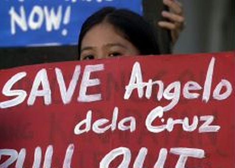 Filippinere demonstrerer i Manila. - Foto: AP 