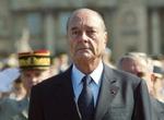 På den franske Bastille-dag har præsident Jacques Chirac meddelt, at franskmændene skal stemme om den nye EU-forfatning. - Foto: AP 