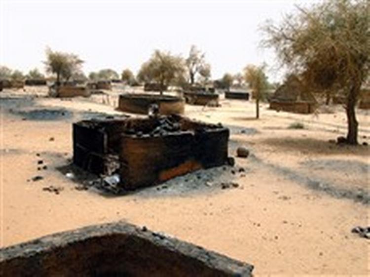 Der er tegn på, at tålmodigheden med grusomhederne er ved at løbe ud. Men løsning på konflikten i Darfur kan trække ud. - Foto: AP 