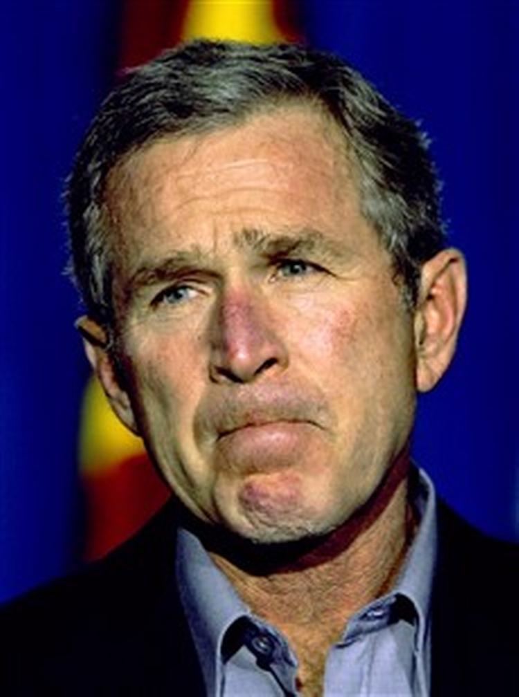 Bush bider smerten i sig. Han har haft væsentligt flere skavanker end sine forgængere - blandt andet hæmorider. - Foto: AP 