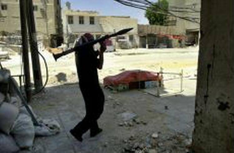 Der har i nat været hårde kampe i den hellige irakiske by Najaf. - Foto: AP 