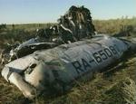 Tv-billeder af vragdele af Tu-134-flyet, der styrtede ned i Tula-regionen 200 km syd for Moskva. - Foto: AP 