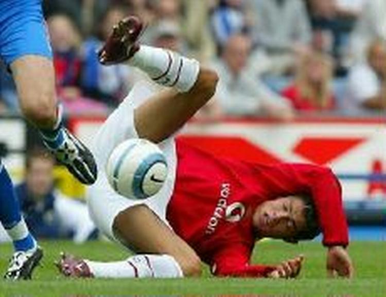 Uniteds Christiano Ronaldo slår kolbøtter mod Blackburn. - Foto: AP 