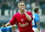 Michael Owen har skiftet Liverpools røde trøje ud med Real Madrids hvide. - Foto: AP 