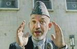 Den siddende, midlertidige præsident, Hamid Karzai er populær i Vesten, men hvad siger afghanerne? - Foto: AP 