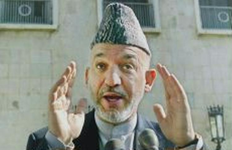 Den siddende, midlertidige præsident, Hamid Karzai er populær i Vesten, men hvad siger afghanerne? - Foto: AP 