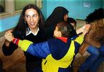 Simona Torretta drog til Irak for at hjælpe, men er nu sammen med en ligeledes 29-årig kollega. - Foto: AP 
