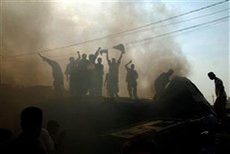 Det eneste, de adskillige, meget militante grupper i Fallujah kan blive enige om, er modstanden mod de amerikanske styrker. - Foto: AP 