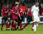 Ronaldo og holdkammeraterne fra Real Madrid kunne blot kigge flovt i græsset, mens Leverkusen kunne juble over tre scoringer. - Foto: AP 