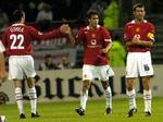 Ruud Van Nistelrooy sikrede med to mål Manchester United et enkelt point i Lyon. - Foto: AP 