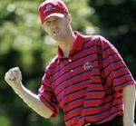 Chris Riley jubler efter han sammen med Tiger Woods har sikret USA et tiltrængt point. - Foto: AP 