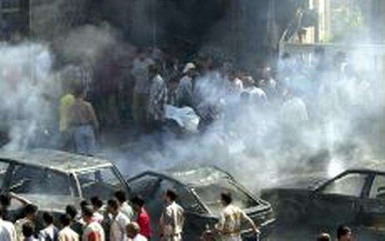 Mindst 11 personer er blevet dræbt ved bilbombeangrebet i Bagdad. - Foto: AP 