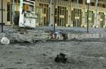 Dagens ret i Bagdad: Ødelæggelser efter et granatnedslag. - Foto: AP 