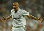 David Beckham jubler efter det lykkedes at komme tilbage i kampen mod Roma. - Foto: AP 