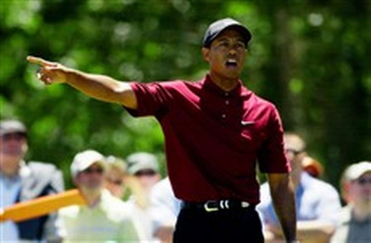 Den amerikanske golfstjerne Tiger Woods har det seneste år haft armen ude til siden mange gange, mens han har skreget  Fore  ned over alverdens golfbaner. Nu prøver han igen i Irland.   Arkivfoto: AP 