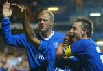 Chelsea's Didier Drogba i midten fejrer sin scoring sammen med John Terry (th.) og Eidur Gudjohnsen. - Foto: AP 