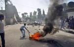 Israelske bulldozere og kampvogne har raseret flere bygninger i stor palæstinensisk flygtnigelejr. - Foto: AP 