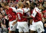Arsenal-jubel efter Henrys frække scoring til 2-0. - Foto: AP 