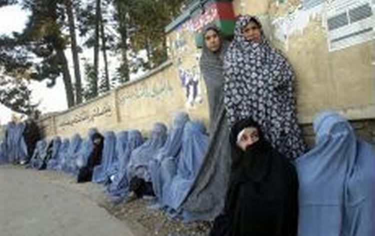 Mere end ti millioner afghanere har ladet sig registrere som vælgere. - Foto: AP 
