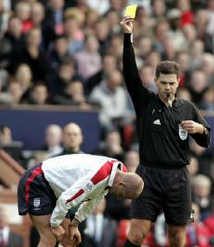 David Beckham fik en advarsel for sit frispark i kampen mod Wales, men straffen kan blive større. - Foto: AP 