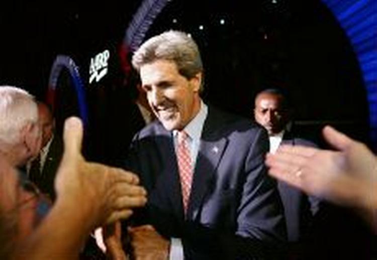 John Kerry roses af flere aviser. - Foto: AP 