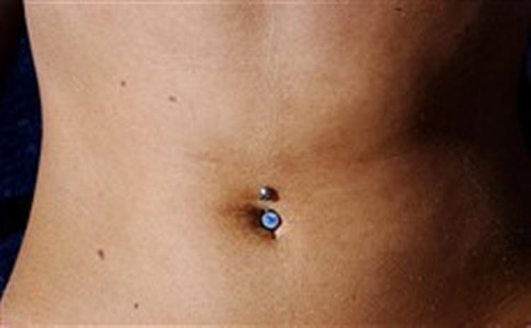Italienerne er et forfængeligt folk, men nu bandlyser en gymnasierektor de bare maver. - Foto: Thomas Borberg 