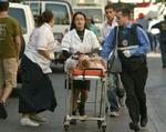Mindst fire mennesker mistede livet ved aktionen i Tel Aviv. 36 blev kvæstet. - Foto: AP 