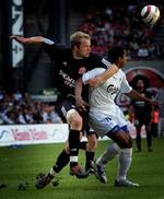 Jacob Krüger i kamp med FCK's Santos under en kamp i Parken i foråret. - Foto: Claus Bonnerup 