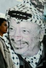 En plakat med Arafat som motiv på en mur i Gaza. - Foto: AP 