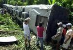 Togulykken skete nær byen Padre Burgos, 165 kilometer fra hovedstaden Manila i Fillippinerne. - Foto: AP 