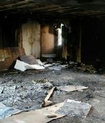 Den lille træmoske var stort set brændt ned, da ilden blev slukket. - Foto: AP 