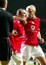 Rooney (t.v.) og Alan Smith fejrer en scoring. - Foto: AP 