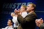 Partisekretær Jens Skipper Rasmussen og næstformand Lars Løkke Rasmussen hylder på Venstres landsmøde Anders Fogh Rasmussen, der blev genvalgt til formand uden modkandidater.   Foto: Rasmus Baaner 