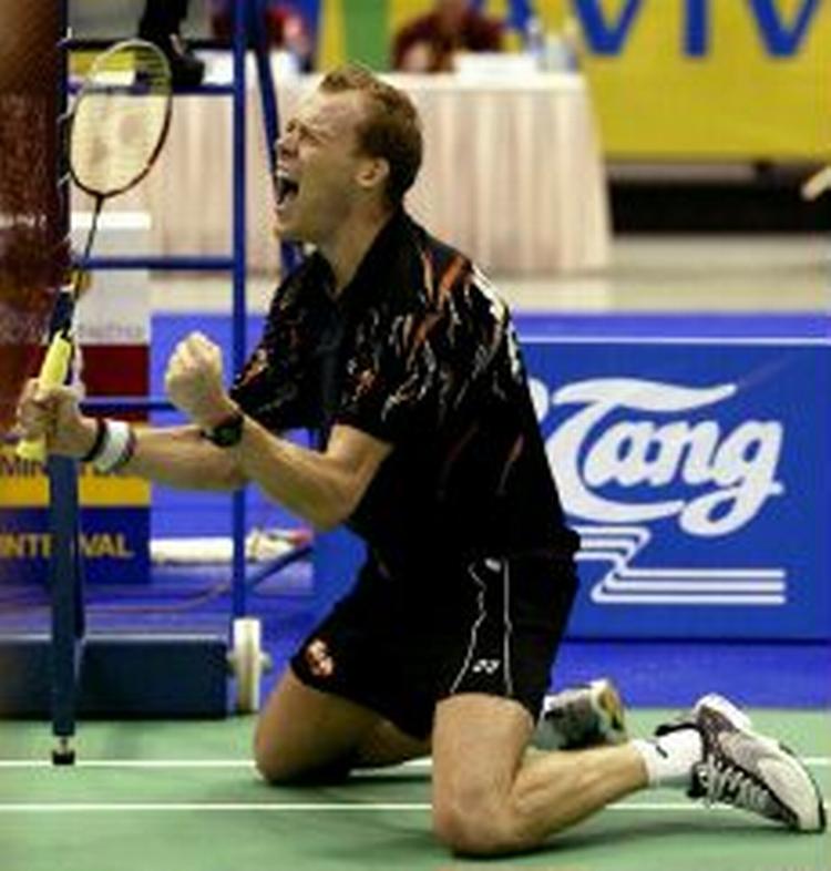 Kenneth Jonassen jubler i Singapore efter at have sikret sig turneringssejren. - Foto: AP 