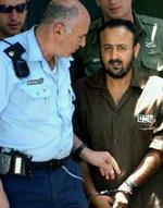 Barghouti sidder i en enecelle i et israelsk fængsel, idømt fem gange livsvarigt fængsel. - Arkivfoto: AP 