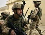 Amerikanske soldater under en aktion i oprørsbyen Mosul. - Foto: AP 
