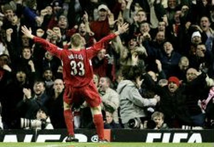 Liverpools Neil Mellor har scoret sejrsmålet mod Arsenal i slutfasen af søndagens storkamp. - Foto: AP 