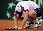 Andy Roddick ærgrer sig over et tabt point til Carlos Moya. - Foto: AP 