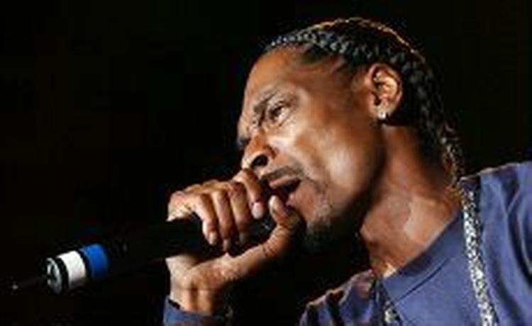 Snoop Dogg - rapper. filmskuespiller og football-træner. - Foto: AP 