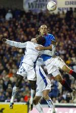 De blå Rangers-spillere er færdige i EUFA Cuppen. - Foto: AP 