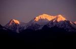 Bhutan får sin friske bjergluft fra Himalaya-bjergkæden. - Foto: AP 